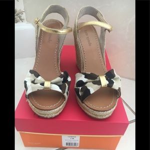 Kate Spade size 7 leopard print wedges w/metallic roping detail on the heel.